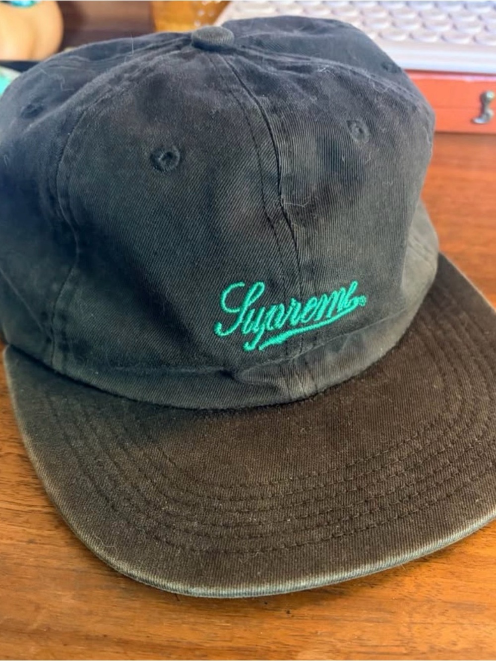 Supreme Black Cap with Teal Accent